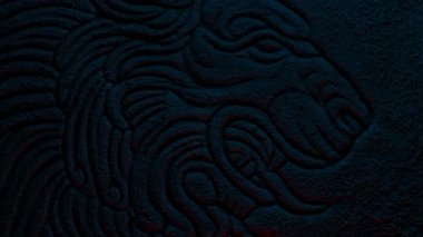 Stone Lion Carving In Firelight Detail