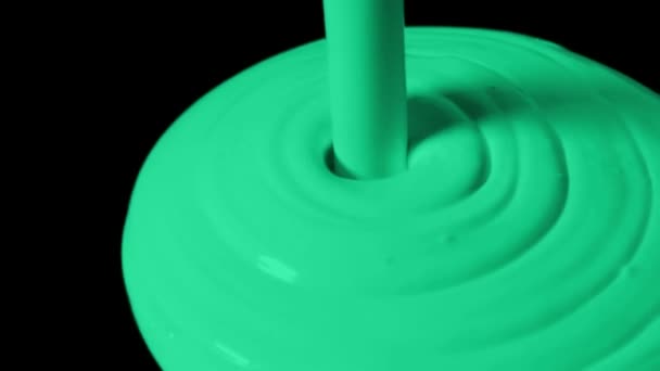 Green Paint Poured Black Surface — Stok Video