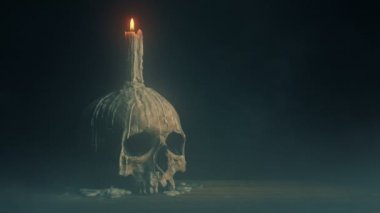 Candle On Skull In Misty Setting