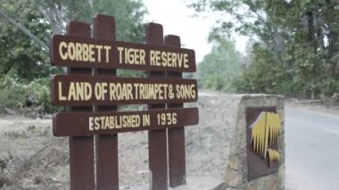 Sign board on the road for the tourist and transportation in the Dense forest of Jim Corbett national park. High-quality Apple Prores 4k footage.