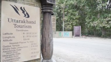 Sign board on the road for the tourist and transportation in the Dense forest of Jim Corbett national park. High-quality Apple Prores 4k footage.