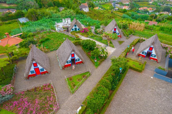 Aerial view of Santana village houses in Madeira known for the traditional homes