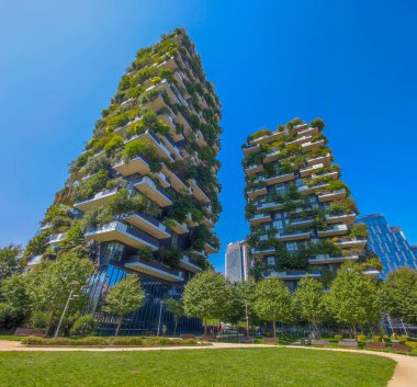 Bosco Verticale in Milan Porta Nuova district also known as Vertical forest skyscrapers. Residential buildings with many trees and other plants in balconies. Ecological green skyscraper