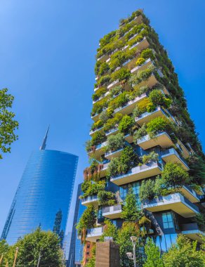Bosco Verticale in Milan Porta Nuova district also known as Vertical forest skyscrapers. Residential buildings with many trees and other plants in balconies. Ecological green skyscraper