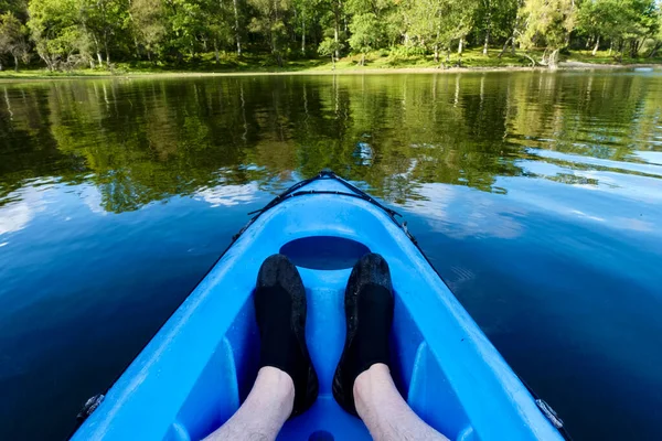 Blue kayak in Loch Lomond on open water — Stock Photo, Image