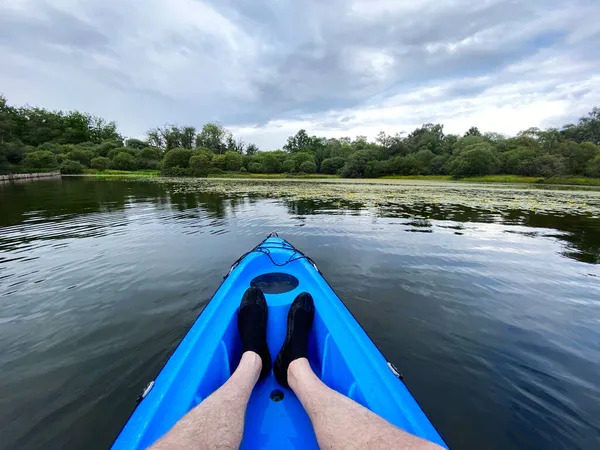 Blue kayak in Loch Lomond on open water — Stock Photo, Image