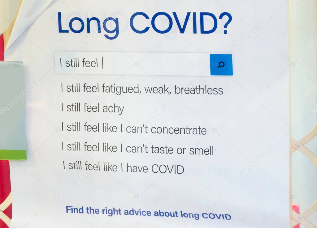 Long covid symptoms sign on pharmacy shop window