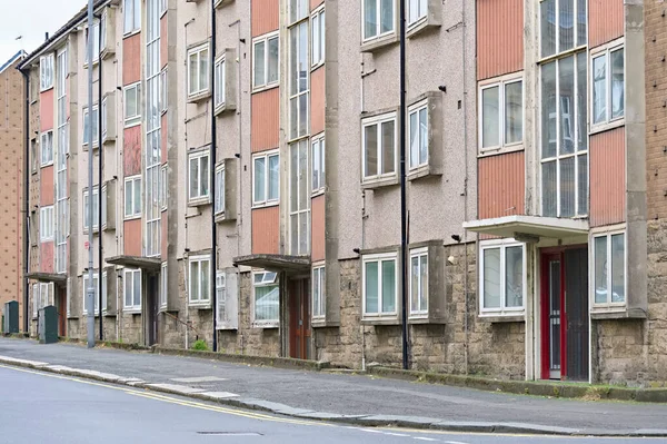 Council flats in poor housing estate with many social welfare issues in Paisley UK
