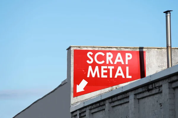 Scrap metal recycling sign at visitors entrance UK