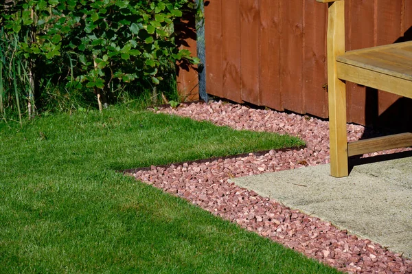 Lawn edging made of metal showing straight and neat finish UK