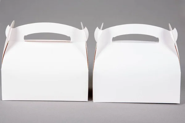 Две Макеты Упаковки Белой Бумаги Пекарни Большой Небольшой Коробки Ручкой — стоковое фото