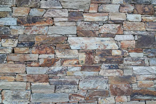 中世のレンガ水平石の古い古代の暗い石の壁の背景壁紙 — ストック写真