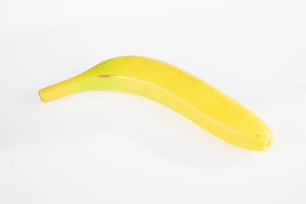 Plástico Amarelo Banana Artificial Isolado Fundo Branco — Fotografia de Stock