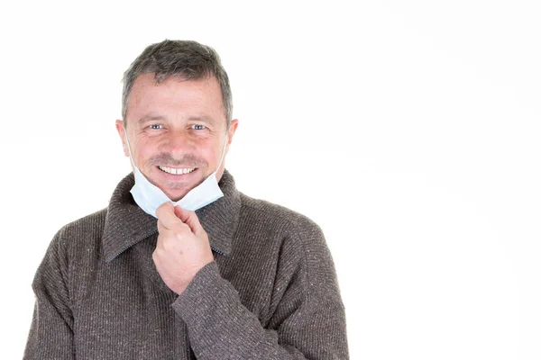 Smiling Happy Man Takes His Mask Stop Covid Infection Fabric — Stock Photo, Image