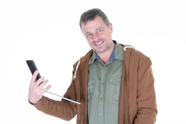 Bonito Homem Meia Idade Segurando Tablet Digital Telefone Celular Mão — Fotografia de Stock