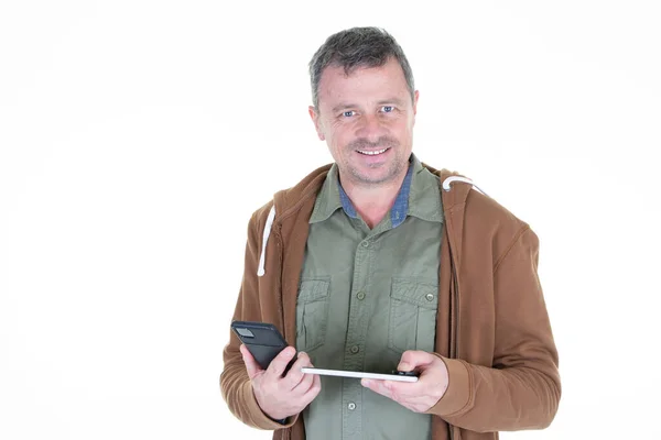 Mężczyzna Średnim Wieku Pomocą Tabletu Cyfrowy Telefon Odizolowany Białym Tle — Zdjęcie stockowe