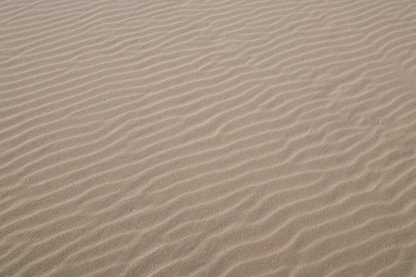 Sand Struktur Vind Våg Vatten Sandstrand Bakgrund Naturliga — Stockfoto