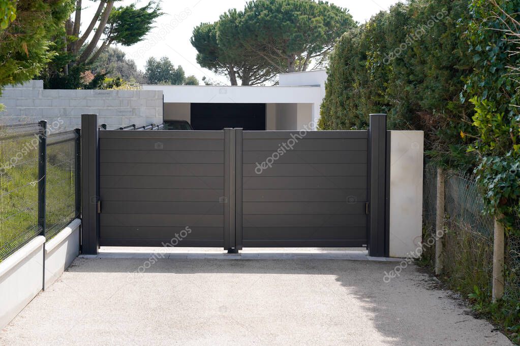 black dark home door aluminum gate slats portal garden of suburb house
