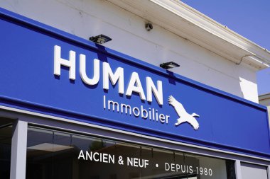 Bordeaux , Aquitaine  France - 04 24 2022 : Human immobilier sign blue bird logo and text for real estate brand store broker on facade office company