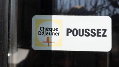 Bordeaux , Aquitaine  France - 05 08 2022 : cheque dejeuner poussez push logo brand and text sign on door entrance windows restaurant