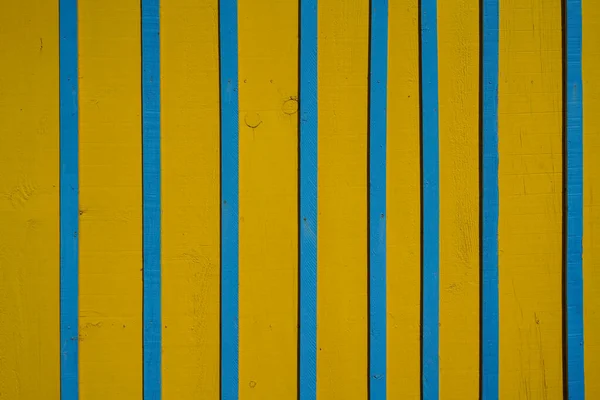 Vertical Background Wooden Planks Cracked Blue Yellow Paint — Photo