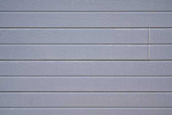 線のテクスチャグレーの木の壁の背景木製の板グレーのフェンスのファサード — ストック写真