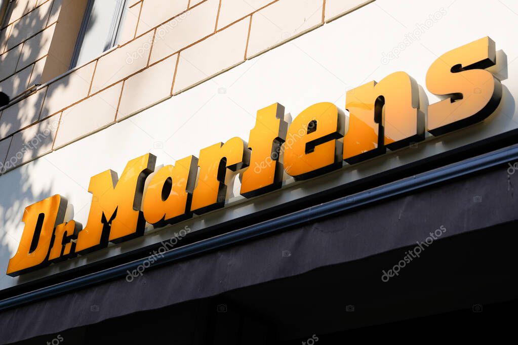 Bordeaux , Aquitaine  France - 05 17 2022 : Dr. Martens logo sign store on facade building wall of gb British footwear and clothes text brand