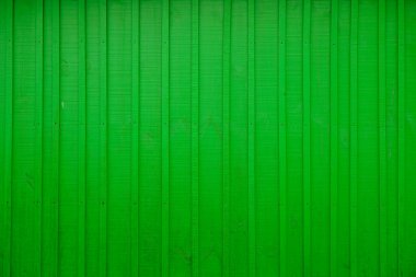 Arkaplan ahşap ön cephe için yeşil parlak ahşap çit dokusu