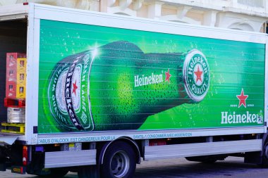 Bordeaux , Aquitaine France - 07 13 2022 : Heineken logo brand and text sign on delivery truck panel van pale lager beer  bottle
