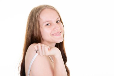 smiling cute young woman portrait in white background happy smile blonde girl