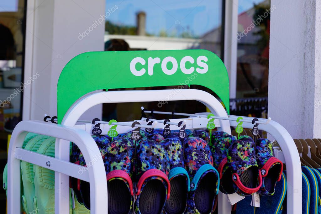 Bordeaux , Aquitaine  France - 07 20 2022 : crocs text sign and logo brand American footwear company store foam clog plastic shoes shop
