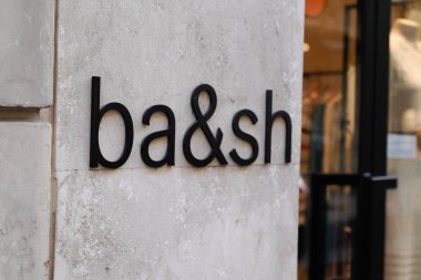 toulouse , occitanie France  - 07 25 2022 : Ba&sh sign text and logo brand entrance door store of fashion Women clothes girls shop