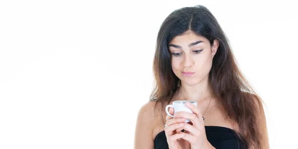 Young Pensive Brunette Woman Pouting Her Cup Coffee Looking Relaxing — 스톡 사진