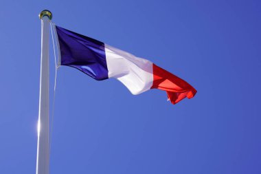 france flag french flutters wave over a blue sky waving on mat