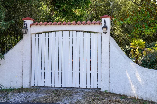 high white entrance gate house suburb portal access home door
