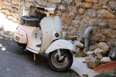 Bordeaux , Aquitaine  France - 08 31 2022 : Vespa Vintage scooter moped in sixties concept parked in street with logo sign and brand text