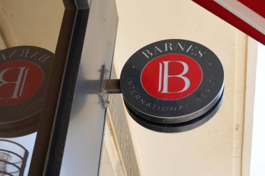 Bordeaux , Aquitaine  France - 08 27 2022 : Barnes brand logo and text sign on wall agency entrance of International property consultant of Realty global real estate