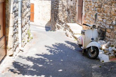 Bordeaux , Aquitaine France - 09 01 2022 : vespa classic white in medieval street scooter parked in city center