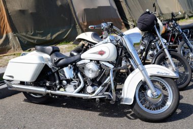 Bordeaux , Aquitaine  France - 05 09 2022 : harley davidson heritage softail bike in street motorbike with logo brand and text sign on white tank of american Motorcycle