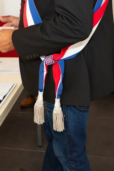 french man mayor tricolor scarf during an official celebration in france town hall
