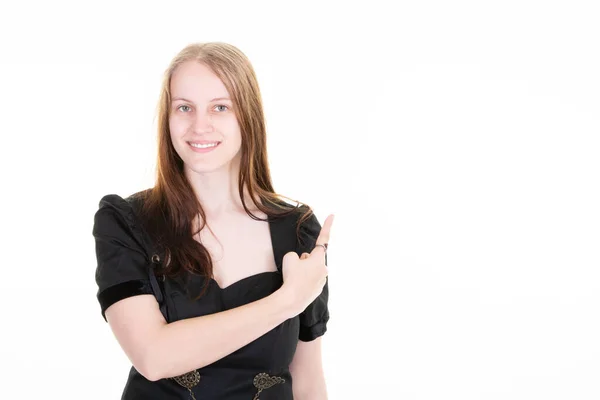 Genç Bir Kadın Boş Ürünü Işaret Ediyor Beyaz Fotokopi Arkaplanı — Stok fotoğraf