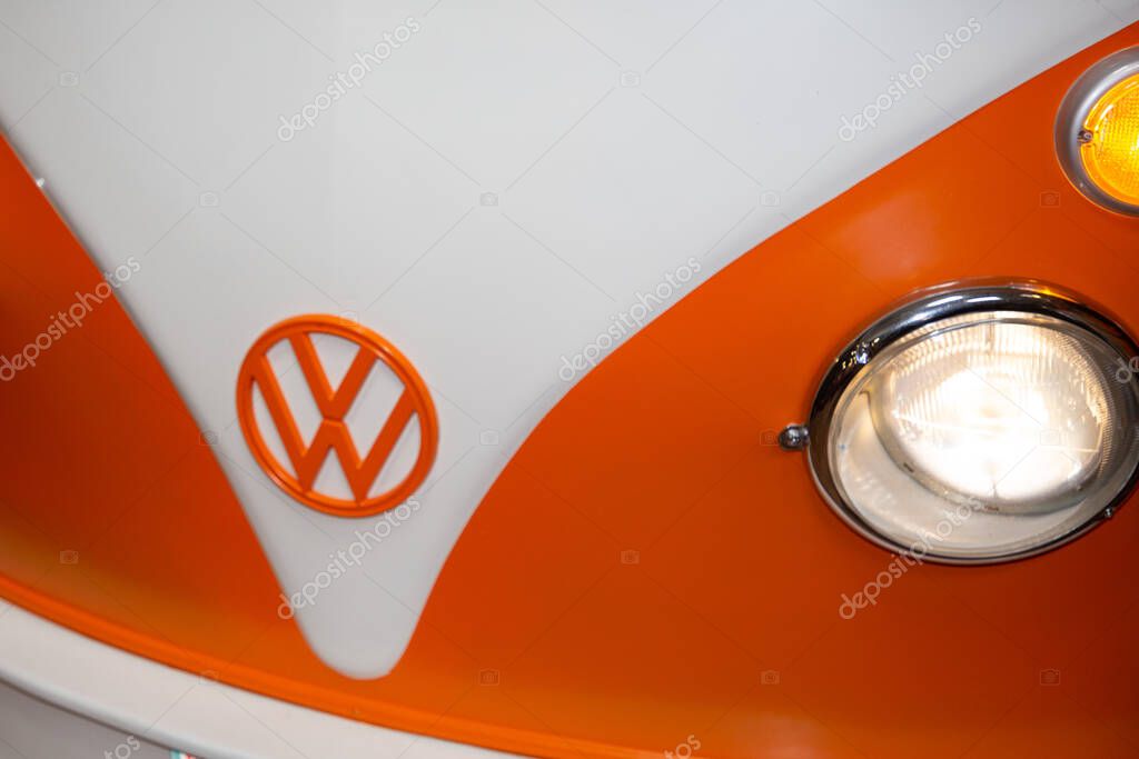 Bordeaux , Aquitaine  France - 01 10 2022 : Volkswagen Old vintage minibus retro classic front logo brand sign bus kombi Type 2 orange white vw bulli