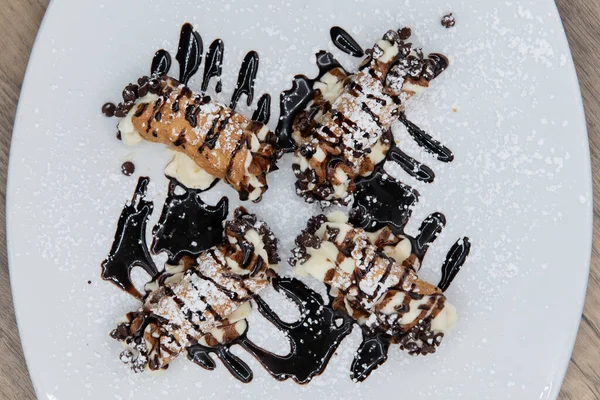 Overhead View Dessert Served Chocolate Chip Cannoli Drizzled Hot Fudge — Stock Photo, Image