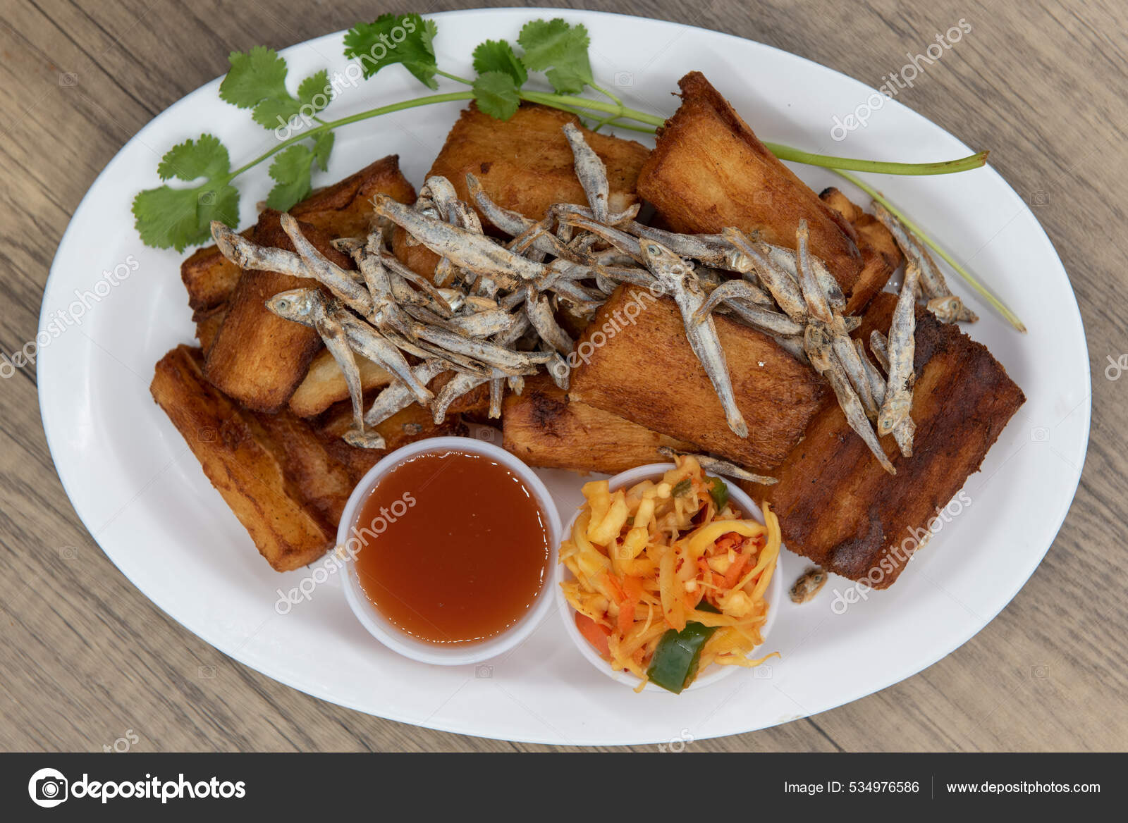 Overhead View Fried Yucca Root Garnished Dried Fish Dipping Sauce Stock