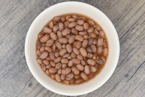 Pandangan Atas Semangkuk Kacang Pinto Yang Hangat Untuk Sempurna Memuji — Stok Foto