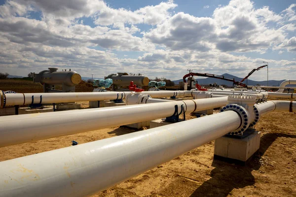 Construction site of an interconnected natural gas transmission pipeline. Highly integrated network that moves natural gas. Connection point between the transmission company and the receiving party.