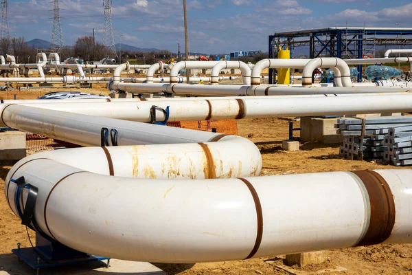 Construction site of an interconnected natural gas transmission pipeline. Highly integrated network that moves natural gas. Connection point between the transmission company and the receiving party.