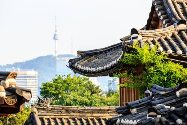 View of Namsan tower from Bukchon Hanok Village, Seoul, South Korea clipart