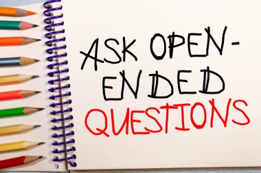 Ask Open Ended Questions written on notebook page, red pencil on the right. Motivational Concept image. clipart