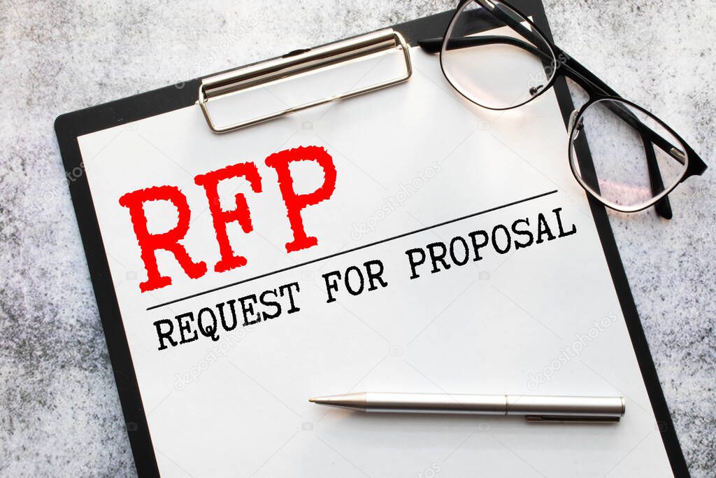 RFP- Request For Proposal written in notebook.